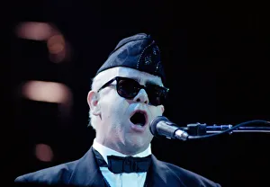Elton John performing in concert in Paris during his Reg Strikes Back Tour Elton John performing in concert in Paris during his Reg Strikes Back Tour