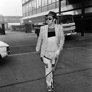 Images Dated 26th February 1980: Elton John pictured arriving at Heathrow Airport from Los Angeles