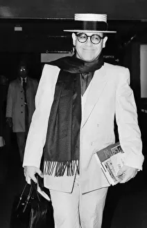 Elton John pop star strolls through the airport on his way to a Californian holiday Elton John pop star strolls through the airport on his way to a Californian holiday