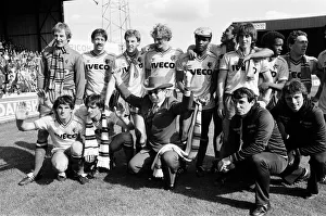 Elton John and the Watford side pose for the photographers after their match against Elton John and the Watford side pose for the photographers after their match against