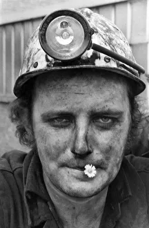 The end of shift as miners leave the cage. May 1972 P018207 The end of shift as miners leave the cage. May 1972 P018207
