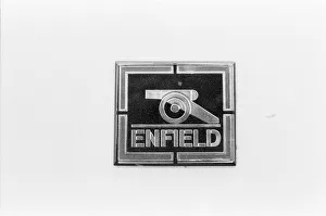 The Enfield Electric Car - company logo badge on the bonet of the car See The Enfield Electric Car - company logo badge on the bonet of the car See