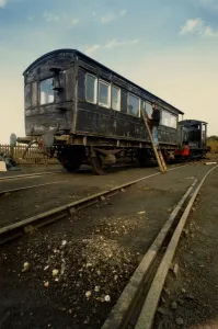 Engineer Ian Cowan takes a look at the rare Victorian saloon carriage on 1st October 1990 Engineer Ian Cowan takes a look at the rare Victorian saloon carriage on 1st October 1990