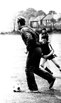 Former England footballer Bobby Moore coaches children at the Coral sponsored Bobby Moore Former England footballer Bobby Moore coaches children at the Coral sponsored Bobby Moore
