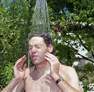 England footballer Chris Waddle takes a shower to wash away Gazza' England footballer Chris Waddle takes a shower to wash away Gazza'