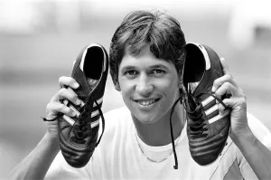 England footballer Gary Lineker shows off his shooting boots at the team base in England footballer Gary Lineker shows off his shooting boots at the team base in
