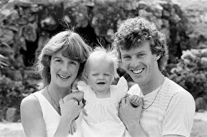 Images Dated 21st June 1982: England footballer Graham Rix relaxing with his wife and baby girl at the team hotel
