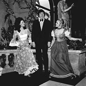 England goalkeeper Gordon Banks wearing a tuxedo and bow tie as he stands with two girls England goalkeeper Gordon Banks wearing a tuxedo and bow tie as he stands with two girls