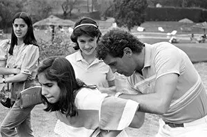 Images Dated 1st June 1986: England goalkeeper Peter Shilton signs autographs for local girls in Mexico City ahead of