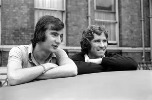 England Players: Alan Hudson and Alan Ball leaning on a car top watching the World go by England Players: Alan Hudson and Alan Ball leaning on a car top watching the World go by