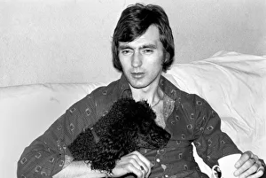 England and Stoke international hero Alan Hudson seen here with his pet poodle England and Stoke international hero Alan Hudson seen here with his pet poodle