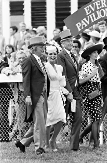 Epsom Derby 4th June 1986. Actress, Joan Collins with husband Peter Holm Epsom Derby 4th June 1986. Actress, Joan Collins with husband Peter Holm
