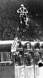 Evel Knievel American motorcycle stuntman daredevil 1975 leaping over buses at Evel Knievel American motorcycle stuntman daredevil 1975 leaping over buses at
