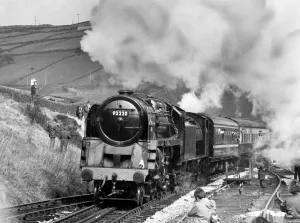Evening Star, the last British rail steam locomotive to be built in Britain pulls in to Evening Star, the last British rail steam locomotive to be built in Britain pulls in to
