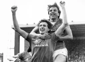 Everton footballer Kevin Sheedy congratulated by teammate Graeme Sharp after he scored Everton footballer Kevin Sheedy congratulated by teammate Graeme Sharp after he scored