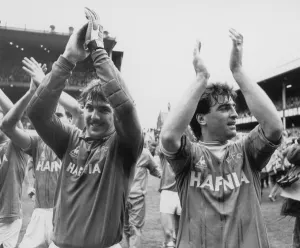 Everton players Neville Southall and Kevin Ratcliffe acknowledge the applause of the fans Everton players Neville Southall and Kevin Ratcliffe acknowledge the applause of the fans