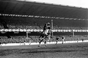 Images Dated 14th February 1970: Everton v. Arsenal: West punches away corner kick from McLintockIs head with Hurst