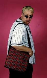 Ewan MacLeod Sunday Mail record bag offer red tartan wearing sunglasses mouth open Ewan MacLeod Sunday Mail record bag offer red tartan wearing sunglasses mouth open