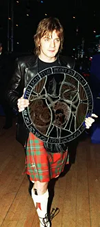 Ewan McGregor actor carrying award Scottish Peoples Film Festival 1997 round targe like Ewan McGregor actor carrying award Scottish Peoples Film Festival 1997 round targe like
