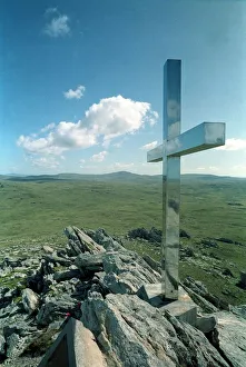 Falklands March 1993 A stainless steel cross set in stone A silver cross honours Falklands March 1993 A stainless steel cross set in stone A silver cross honours