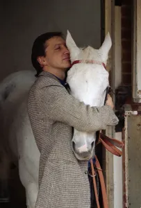 Famous racehorse Desert Orchid in his stables with owner Richard Burridge Famous racehorse Desert Orchid in his stables with owner Richard Burridge