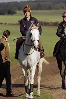 Famous racehorse Desert Orchid being taken out for a training session with jockey Richard Famous racehorse Desert Orchid being taken out for a training session with jockey Richard