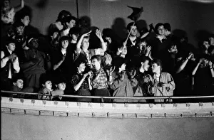 fans of British pop group The Thompson Twins watch them performing on stage during a fans of British pop group The Thompson Twins watch them performing on stage during a