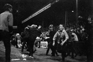 Fans run onto the pitch. Mansfield v. Liverpool. September 1970 71-00193-003 Fans run onto the pitch. Mansfield v. Liverpool. September 1970 71-00193-003