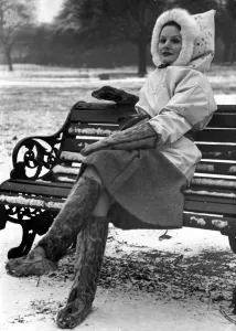 Fashion 1930s Miss Esme Watson sitting on a park bench in Regent' Fashion 1930s Miss Esme Watson sitting on a park bench in Regent'