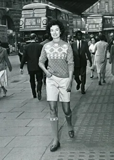 Fashion 1950s Model wearing shorts and a wool jumper Fashion 1950s Model wearing shorts and a wool jumper