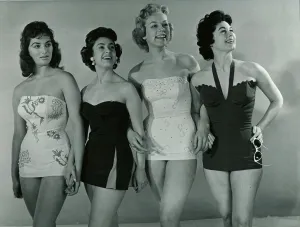 Fashion 1950s Four models wearing swimwear / swimming costumes in a corset style Fashion 1950s Four models wearing swimwear / swimming costumes in a corset style