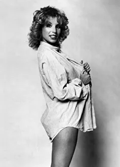 Fashion - 1970s. How to give an old prison shirt a new look - put a dolly bird Fashion - 1970s. How to give an old prison shirt a new look - put a dolly bird