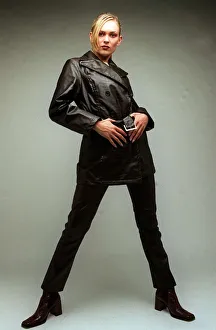 Fashion A model wearing black leather jacket and trousers 1996 Fashion A model wearing black leather jacket and trousers 1996