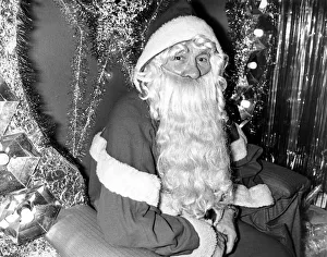 Father Christmas sitting in his chair waiting for his next visitor Father Christmas sitting in his chair waiting for his next visitor