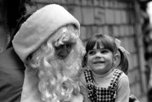 Father Christmas talks to children in a Manchester store. December 1971 71-12035-008 Father Christmas talks to children in a Manchester store. December 1971 71-12035-008