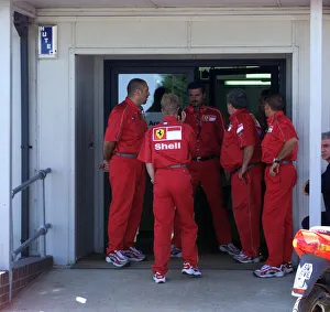Ferrari team members rush to the medical centre for news on Michael Schumacher Ferrari team members rush to the medical centre for news on Michael Schumacher