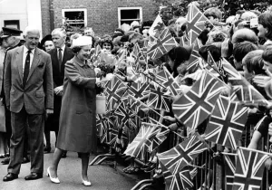 Flags flying as Her Majesty meets the people of Newtown. 12th July 1986 Flags flying as Her Majesty meets the people of Newtown. 12th July 1986