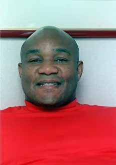 Fomer boxing champion George Foreman in a London hotel resting on bed September 1990 Fomer boxing champion George Foreman in a London hotel resting on bed September 1990
