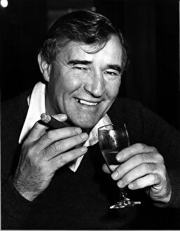 00236 Collection: Football manager Malcolm Allison with a cigar and a glass of wine. Circa 1975