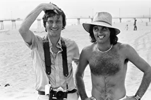 Footballer George Best poses on the beach withDaily Mirror Staff Photographer Kent Gavin Footballer George Best poses on the beach withDaily Mirror Staff Photographer Kent Gavin