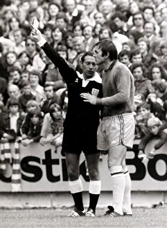 Footballer Jimmy Rimmer is booked by referee for marking the pitch' Footballer Jimmy Rimmer is booked by referee for marking the pitch'