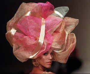 France Paris Fashion Week 1997 with model walking on catwalk wearing an unusual pink France Paris Fashion Week 1997 with model walking on catwalk wearing an unusual pink