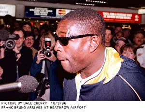 Frank Bruno addresses the press after arriving back at Heathrow airport after his defeat Frank Bruno addresses the press after arriving back at Heathrow airport after his defeat