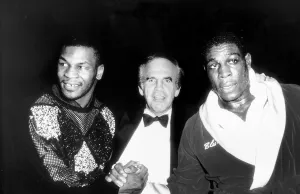 Frank Bruno Boxing and Mike Tyson shake hands watched over by promoter Micky Duff Frank Bruno Boxing and Mike Tyson shake hands watched over by promoter Micky Duff