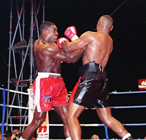 Frank Bruno lands another punch to the head of Oliver McCall in his WBC championship Frank Bruno lands another punch to the head of Oliver McCall in his WBC championship