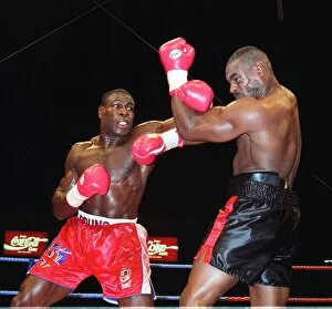 Images Dated 3rd September 1995: Frank Bruno lands another punch to the head of Oliver McCall in his WBC championship
