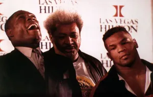 Frank Bruno Mike Tyson boxers with promotor Don King at a press conference Frank Bruno Mike Tyson boxers with promotor Don King at a press conference