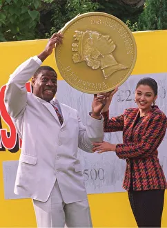 Frank Bruno and Miss World Aishwarya Rai launch the new Littlewoods Scratchcard whose Frank Bruno and Miss World Aishwarya Rai launch the new Littlewoods Scratchcard whose