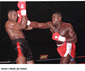 Frank Bruno strikes Oliver McCall with a right cross during their fight at Wembley Frank Bruno strikes Oliver McCall with a right cross during their fight at Wembley