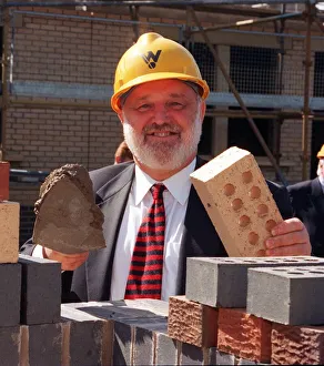 Frank Dobson Laying bricks at Springburn August 1997 Frank Dobson Laying bricks at Springburn August 1997